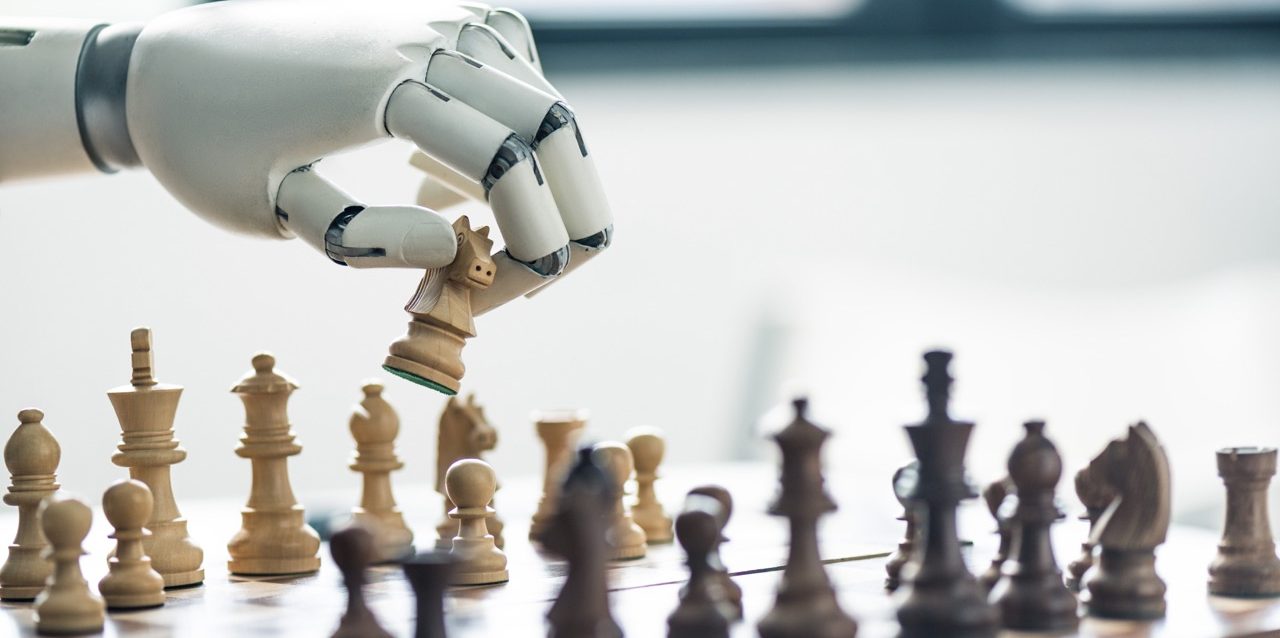 close-up view of robot playing chess, selective focus